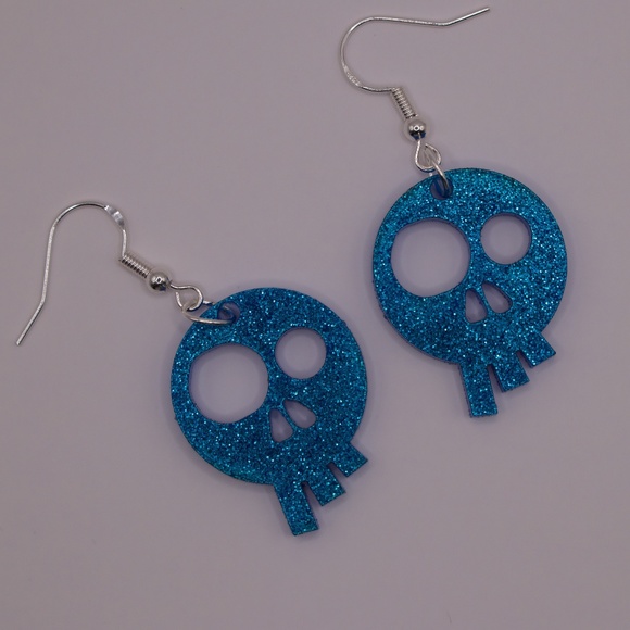 Jewelry - Acrylic Skull Earrings Blue Glitter